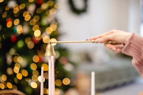 girl extinguishes candles